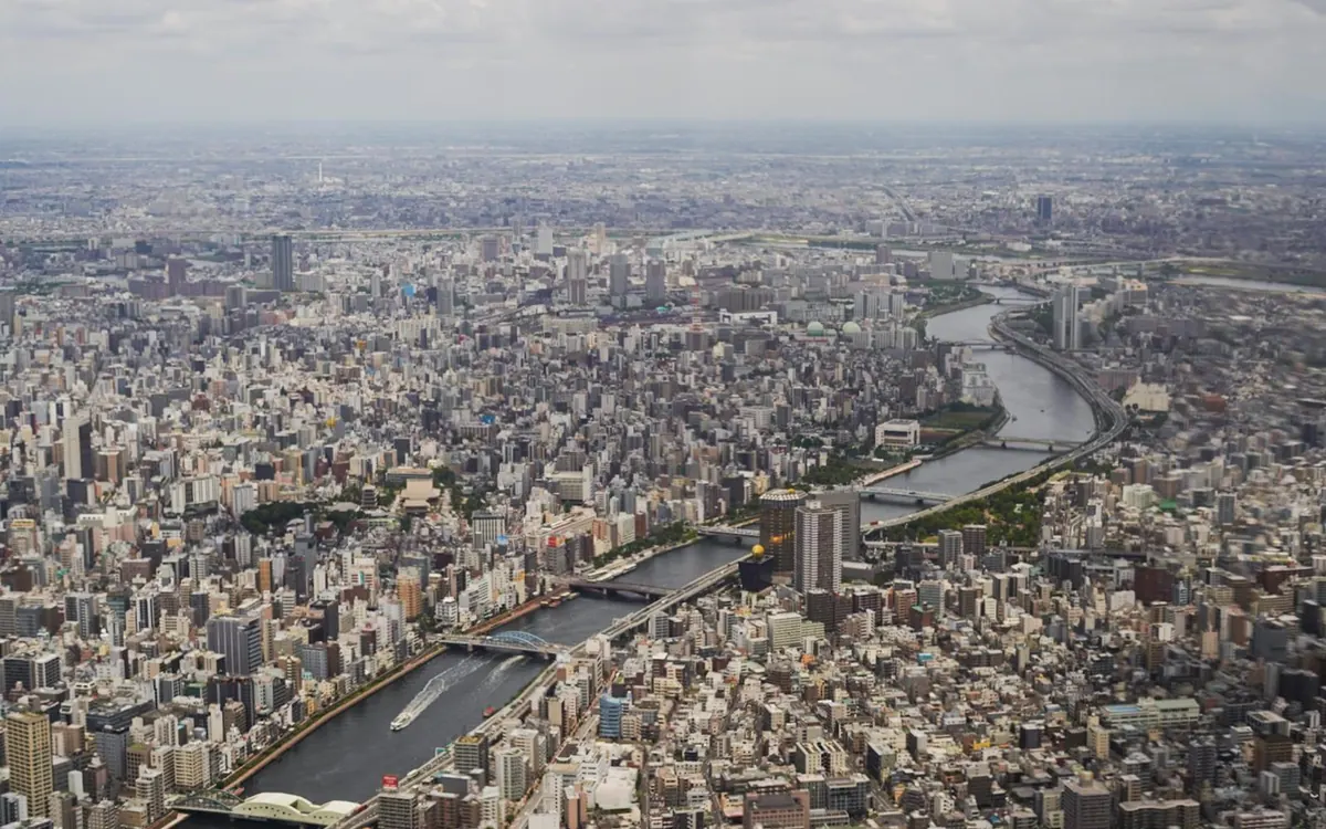 A river and its bridges running through central Tokyo, seen from above